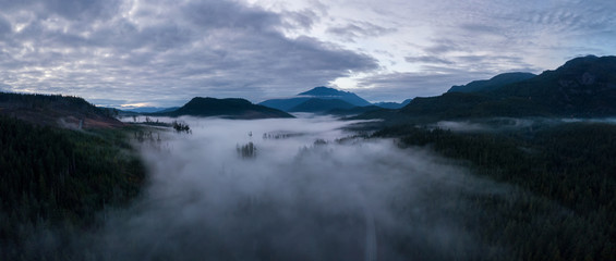 Aerial Drone Panoramic View of the Beautiful Canadian Landscape during a cloudy sunset. Taken in Vancouver Island, British Columbia, Canada.