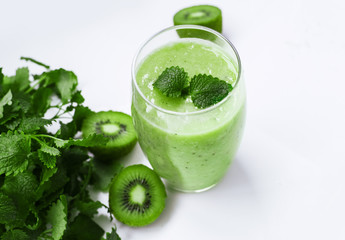 Green fresh smoothies with kiwi and mint