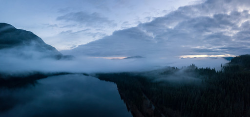 Aerial Drone Panoramic View of the Beautiful Canadian Landscape during a cloudy sunset. Taken in Vancouver Island, British Columbia, Canada.