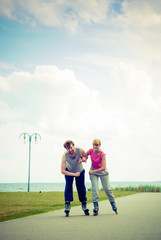 roller skater couple skating outdoor