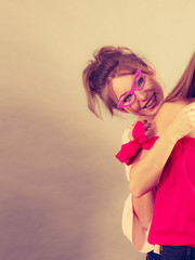 Woman pretending wearing eyeglasses