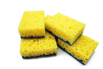 Yellow sponge for washing dishes isolated on white background.