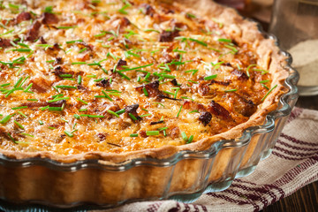 Homemade quiche lorraine with bacon and cheese