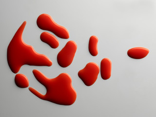 red nail polish drops