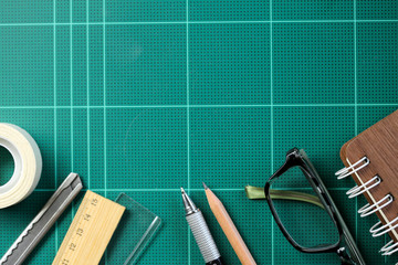 Desk with school stationary or office tools. Flat lay set of artist school stationery studio shot on school table background. School equipment concept.
