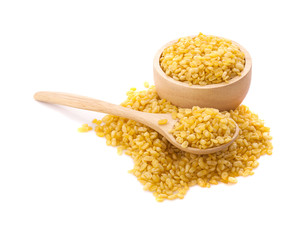 Hulled-split monk bean in wooden spoon isolated on white background