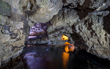 Smoo Cave near Durness, Scotland. The flooded inner chamber of the natural geological landmark on...
