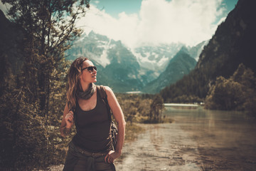 Woman enjoying amazing view of Lago di Braies