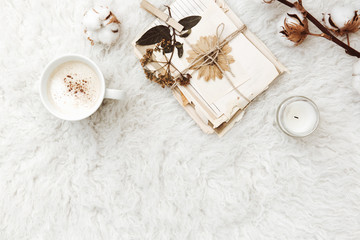 Flat lay composition with coffee, dry flowers, cotton and old letters. vintage toning background