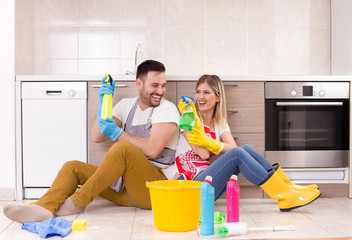 Man and woman happy about finishing chores