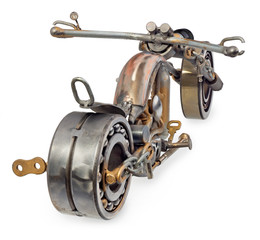 Handmade motorcycle, chopper, cruiser composed of metal parts, bearings, śtubokrętów, candles...