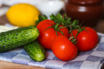 Fresh vegetables and herbs. Tomatoes, cucumbers, pepper