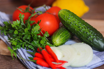 Fresh vegetables and herbs. Tomatoes, cucumbers, pepper