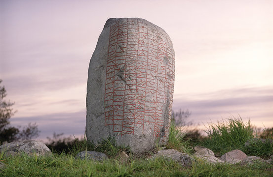 Boulder covered in runes