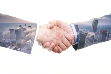 Double exposure business handshake