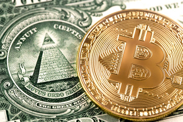 bitcoin on one dollar close up