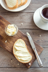 Bread, butter, coffee for breakfast