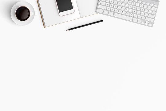 Modern workspace with coffee cup, smartphone, paper, notebook, tablet and laptop copy space on white color background. Top view. Flat lay style.