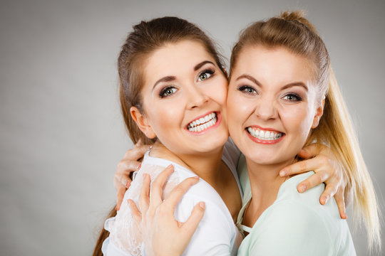 Two Happy Friends Women Hugging