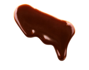 Chocolate syrup drips in shape of light bulb isolated on white