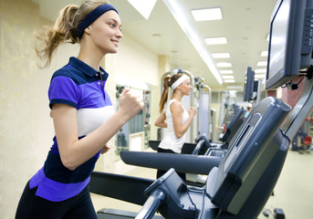 Fototapeta premium sporty people in gym
