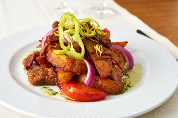 Pork Brasov with cooked potato and vegetables