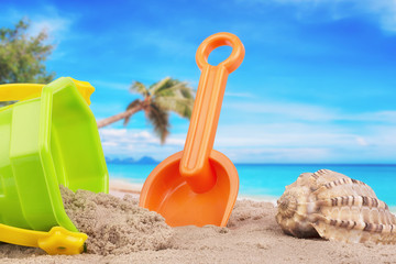 Fototapeta na wymiar Bucket and shovel toys at the beach.