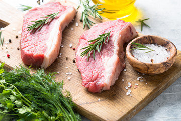 Raw beef striploin steak.