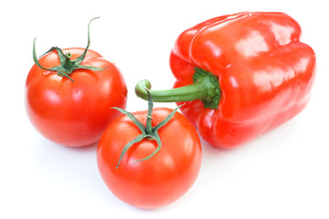 Fresh red sweet Bulgarian pepper and tomatoes vegan vegetables