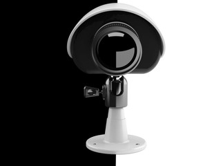 Fototapeta premium Security camera isolated on black and white background