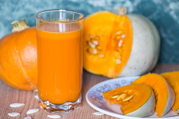 Pumpkin juice in glass in kitchen