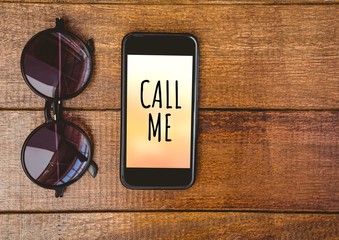 call me text on phone with sunglasses