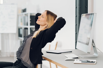 Young businesswoman taking a moment to relax