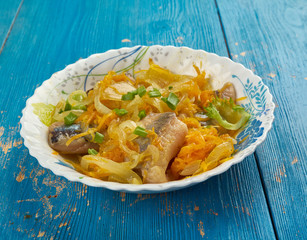 Herring in carrot and onion marinade