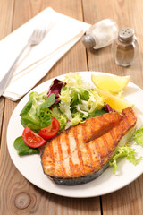grilled salmon steak with salad