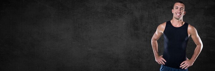 Obraz premium Fit strong Man with dark background