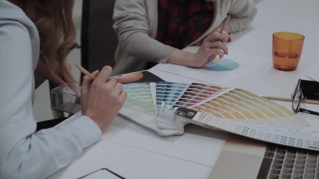 Lady Designers Working On Color Concept