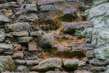 Stone wall of an abandoned castle