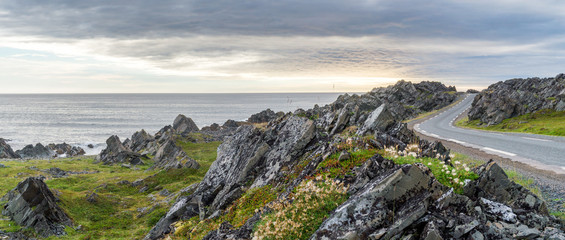 Rocky cliffs on the coast of the Barents Sea along the Varanger Tourist Route © natagolubnycha