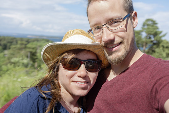 Portrait of man and woman in open air