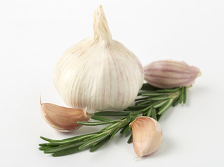 Fresh garlic with rosemary isolated on white background. Isolated garlic