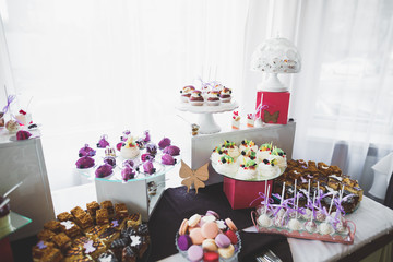 Different kinds of baked sweets on a buffet
