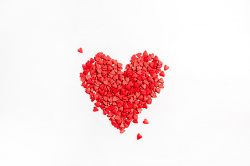 Valentine's Day composition. Red heart symbol on white background. Flat lay, top view Love concept.