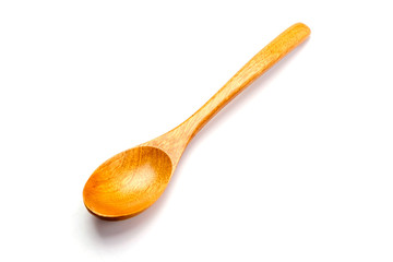 Wooden spoon on white background