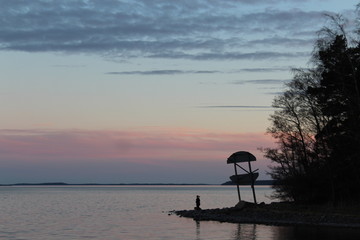by the shore
