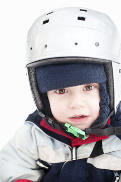 Headshot of boy in winter clothing with helmet
