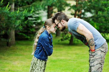 Naklejka premium Kid girl and father