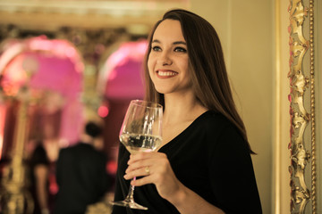 Beautiful girl drinking wine