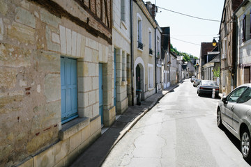 Fototapeta na wymiar residential houses and cars on street in Amboise