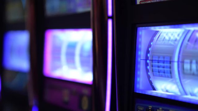 Las Vegas Spinning Slot Machines Closeup Video. One Handed Bandits.